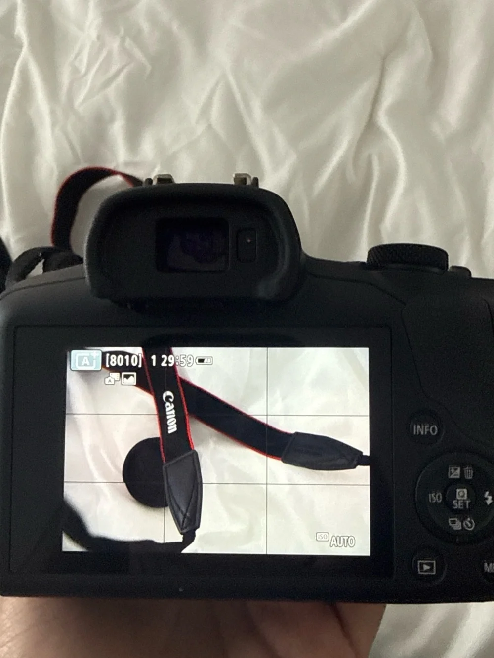 Canon EOS R100 Compact Mirrorless Camera with Red-Trim Strap – Black